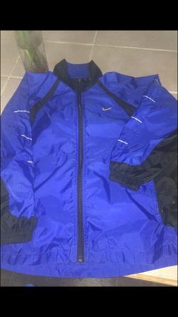 In great condition Nike jacket size 10-12 years