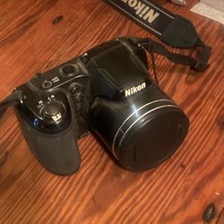 With Tripod And Nikon Neck strap