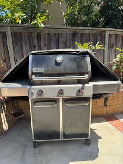 Weber bbq with King Kong cover