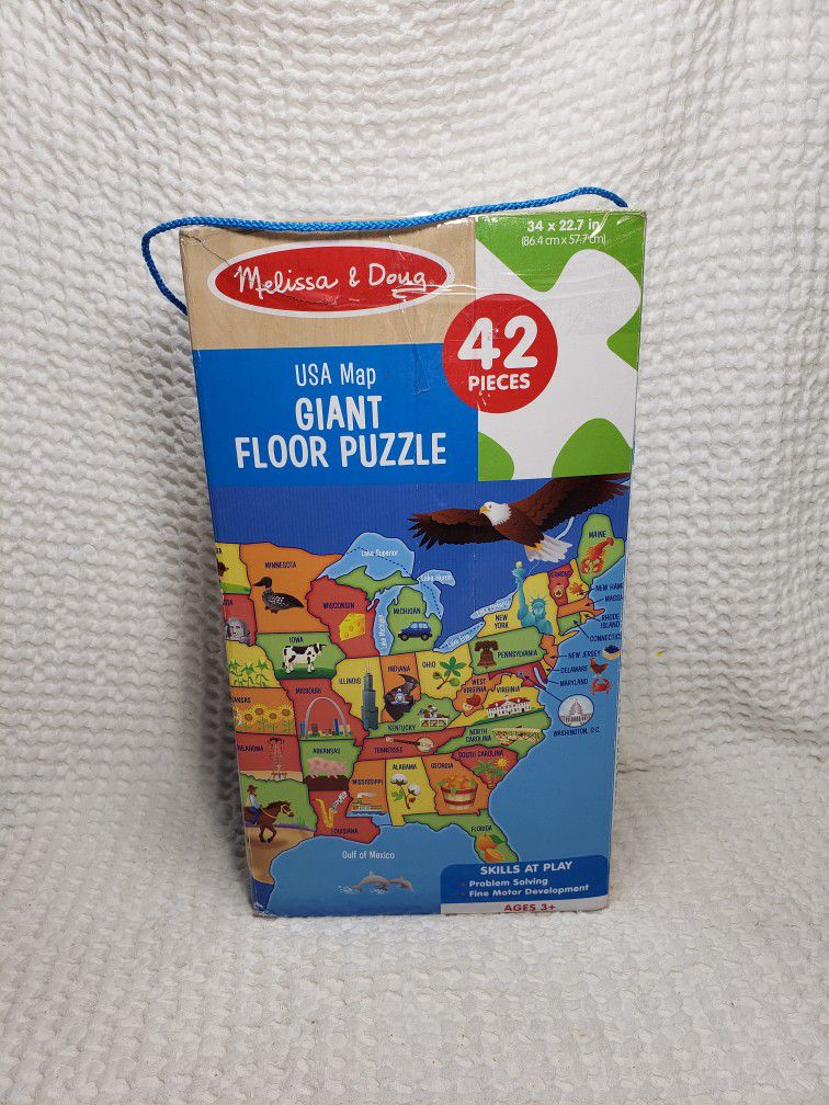 Melissa and Doug United States  map floor puzzle 42pc . Measures 33" X 22 7"  . Good condition and smoke free home.