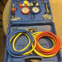 Manifold kit with hose and accessories for recharging and maintaining air conditioners. 