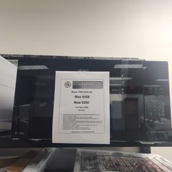 Profile 2.2 cu. ft. Built-ln Microwave in Black with Sensor Cooking