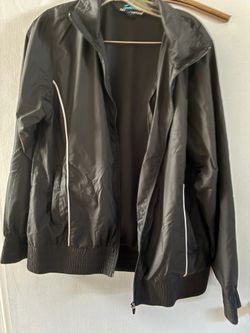 1264. Ladies Tri-Mountain black jacket size medium. $5.00
