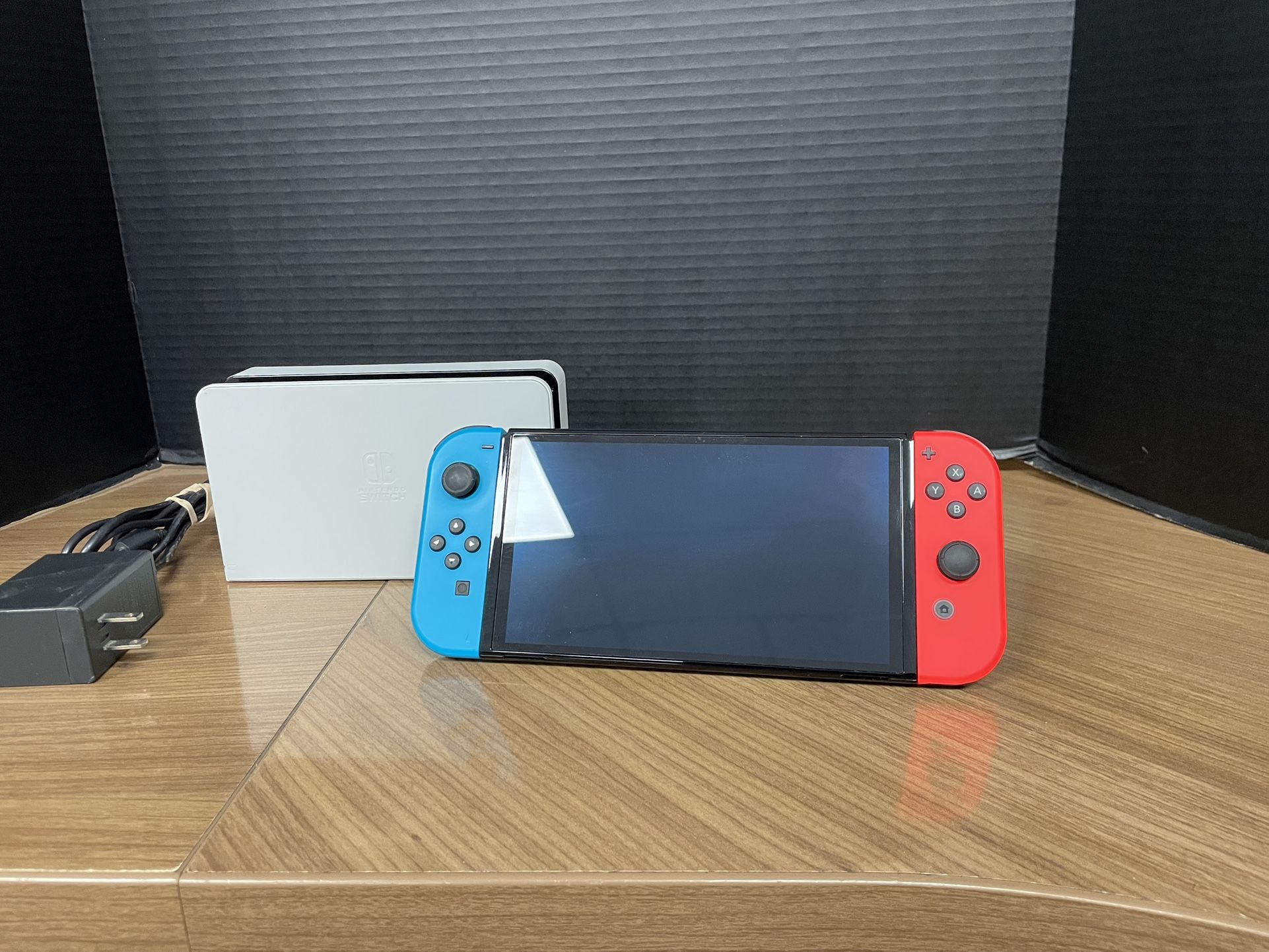 OLED Nintendo Switch 64gb with docking station no offers or trades please!!