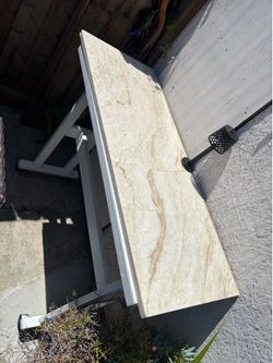 Table with wheels and granite