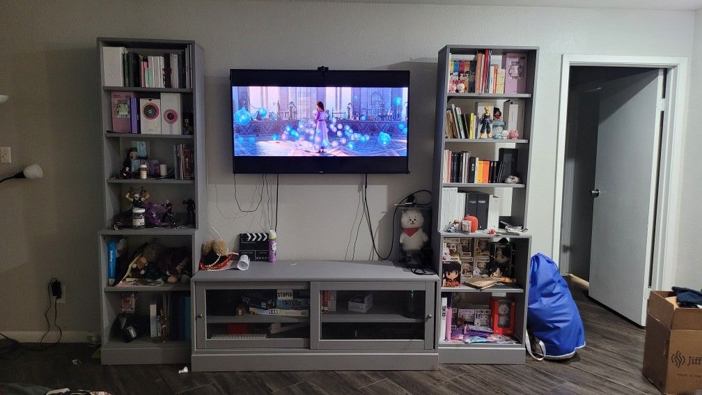 Gray Entertainment center with shelves