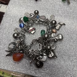 Sterling Silver Charm Bracelet Made Of Single Earrings 