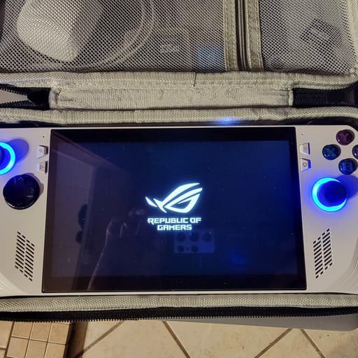 Asus ROG Ally Extreme. Opened and set up never used. Carrying case, screen protector, 2tb Mico sd, Asus ROG earbuds brand new. Also has original Box