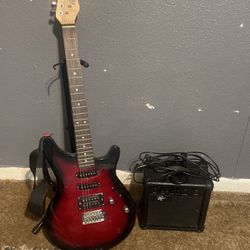Black And Red Guitar And AMP
