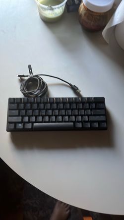 60% Compact Mechanical Keyboard and a Logitech mouse