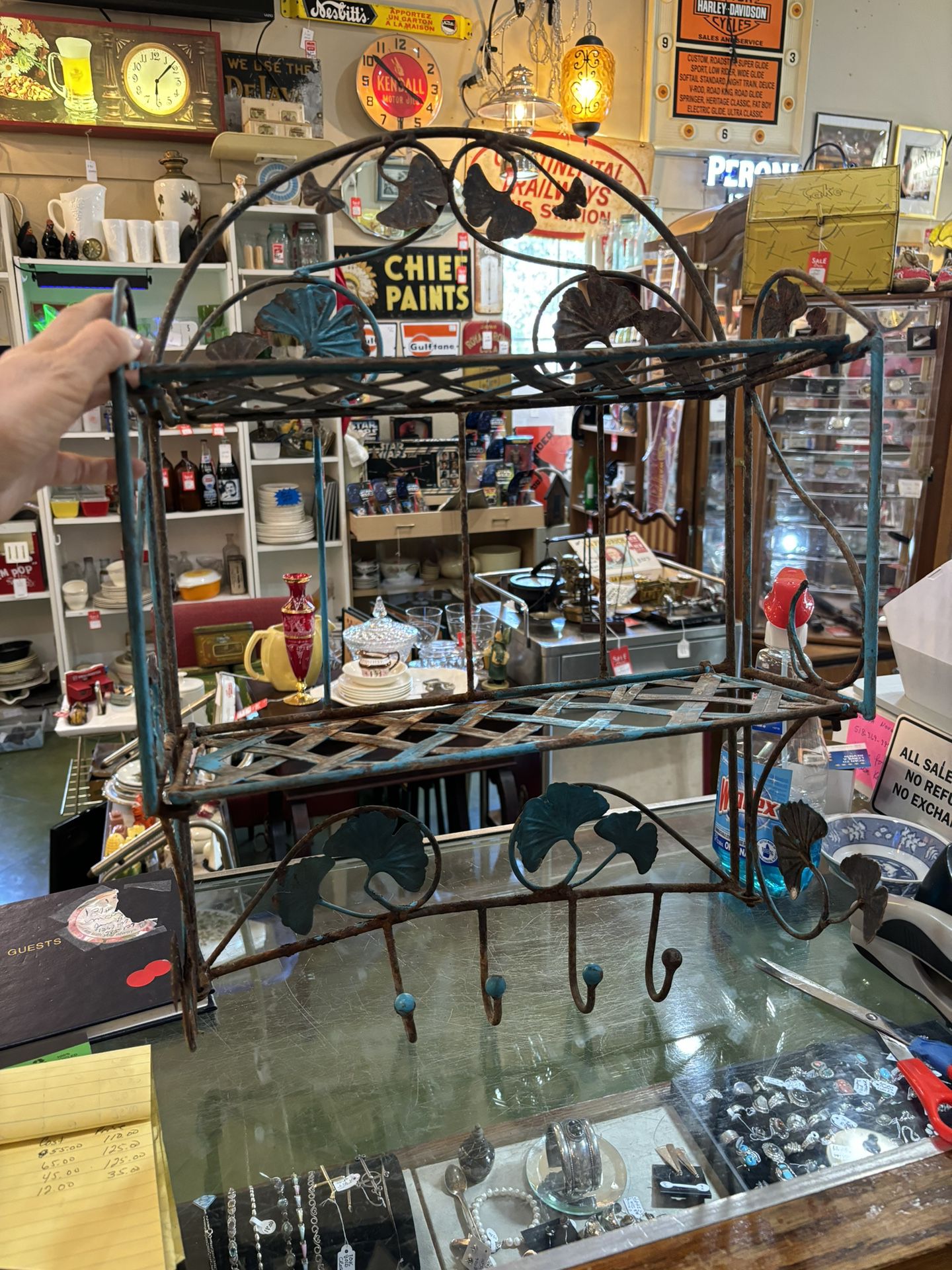 16x7x23 vintage metal shelves and hooks. Great for indoors or outdoor garden.  35.00.  Johanna at Antiques and More. Located at 316b Main Street Buda.