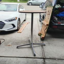 Unfinished Wood And Chrome Cocktail Table