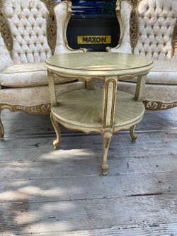Elegant vintage armchairs with floral upholstery and matching table.$500 Located Mount Dora Fla 32757