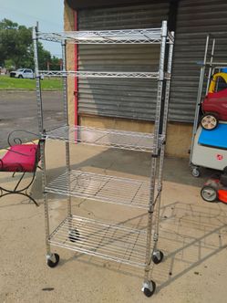 Chrome 5-Tier Heavy Duty Steel Garage Storage Shelving Unit features adjustable shelves and rolling casters for mobility 65x30x14