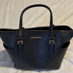 Michael Kors and wristlet