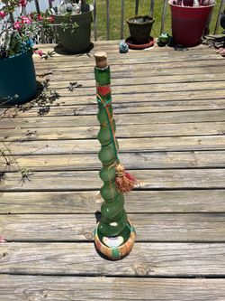 Vintage green spiral glass bottle