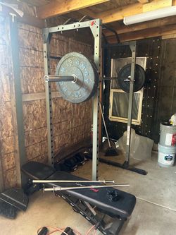 Power Rack with Barbell, Weights, and Bench