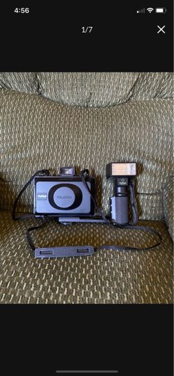 Vintage Polaroid pro pack instant camera with detachable pro flash