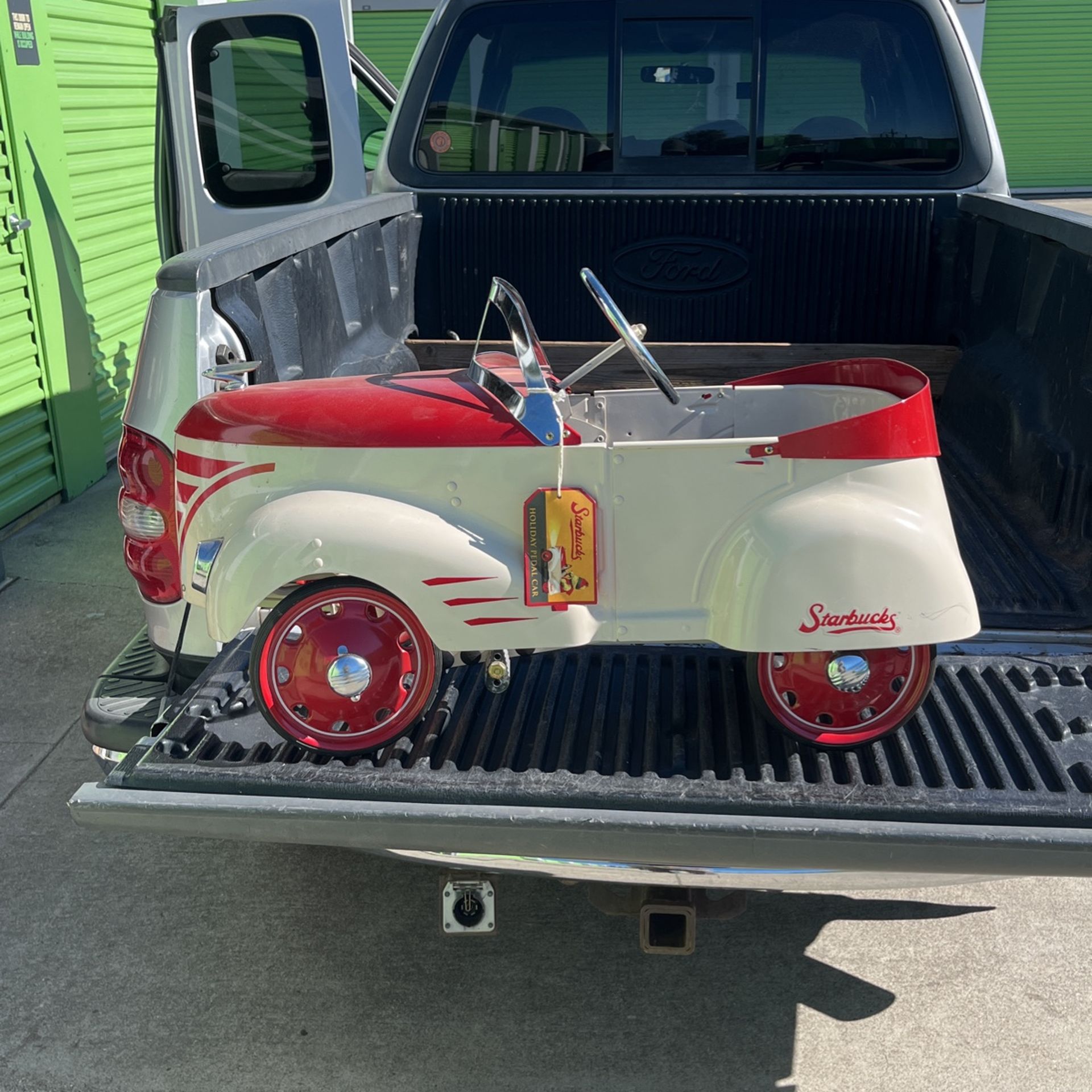 Starbucks pedal car in good condition