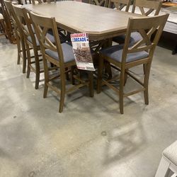 Nine piece counter height dining room set