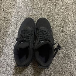 Black Cat Jordan 4s