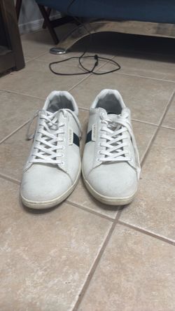 White and navy Lacoste striped shoes
