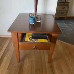 Two identical end tables. Beyond excellent condition. $300