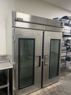 TRUE REFRIGERATOR 68” stainless steal 2 section glass door roll-in refrigerator