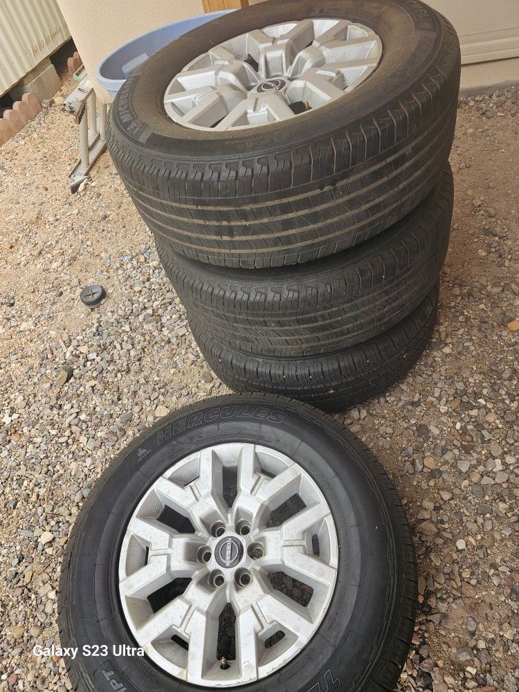 4 Tires and Lug Nuts With Key. 2 Almost New!