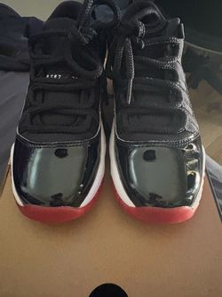 Air Jordan 11 Bred Low-Top Sneakers