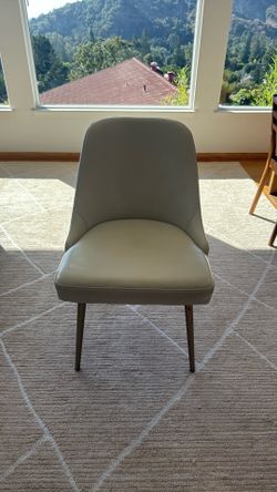 West Elm custom made white leather chairs
