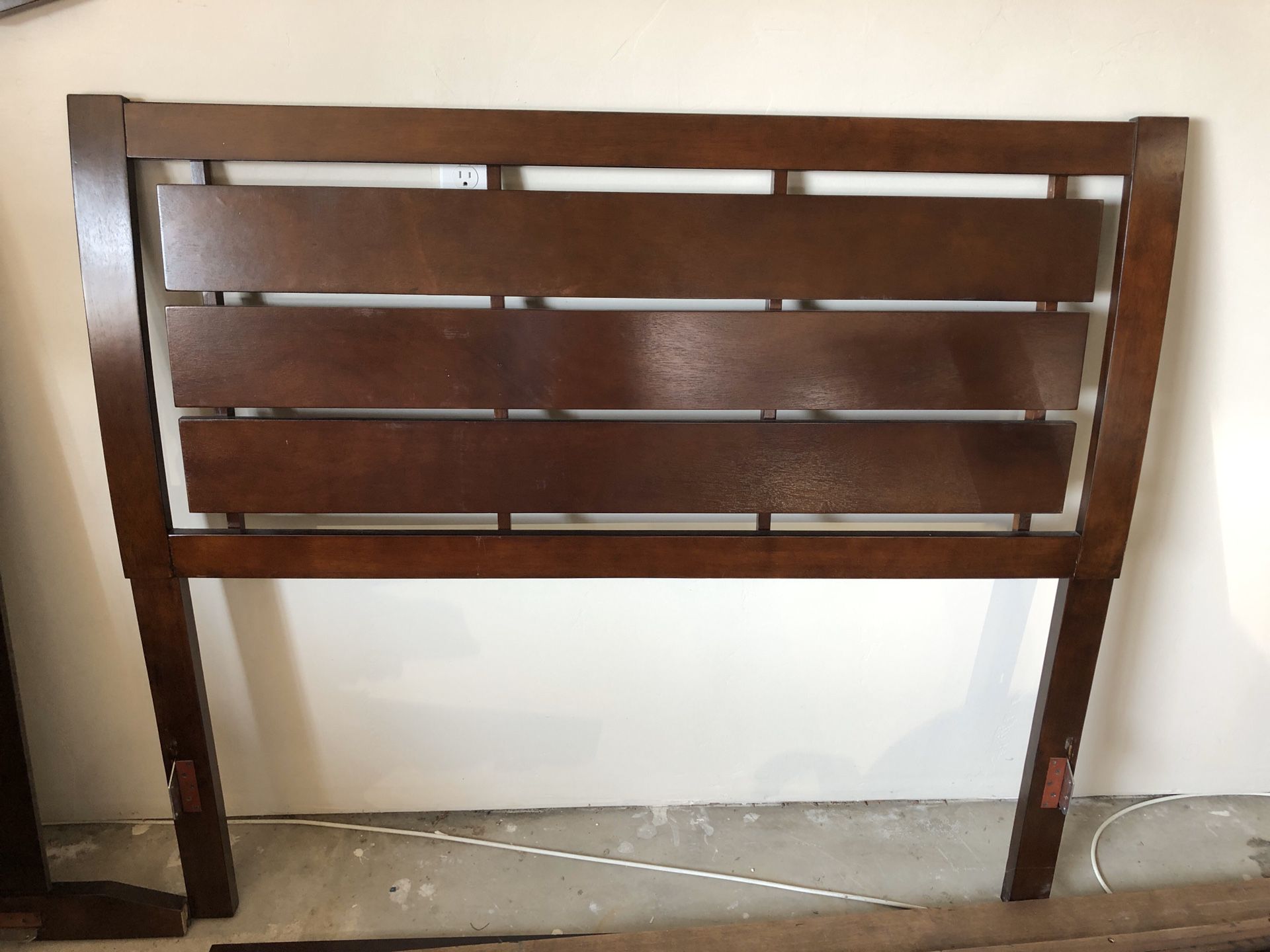 Brown wood full size bed frame