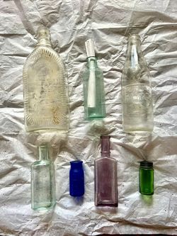 Set Of 7 Antique Bottles