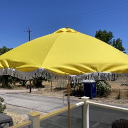 Brand new yellow patio umbrella with white fringe 