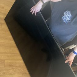 Large Television, Wall Mounted