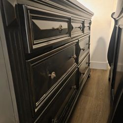 USED BLACK WOODEN DRESSER