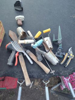 Assortment of garden tools cleaning out garden room downsizing
