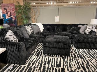  Large 3 piece Sectional features luxuriously soft jumbo corduroy fabric