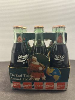 Coca Cola Around The World 6 pack full sealed bottles Santa