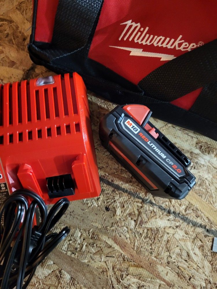 Milwaukee M18 18 Volt Lithium Ion 2ah battery Charger and Bag.