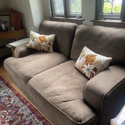 Two Couches And Ottoman