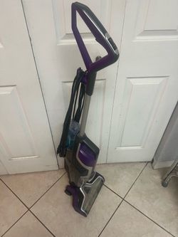 BISSELL CrossWave Pet Pro multi-surface wet/dry vacuum cleaner in purple and titanium.