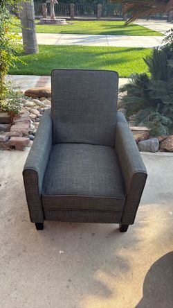 Recliner sofa dark grey in very good condition.