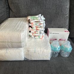 New Newborn & Size 1 Diapers & Unused Bottles