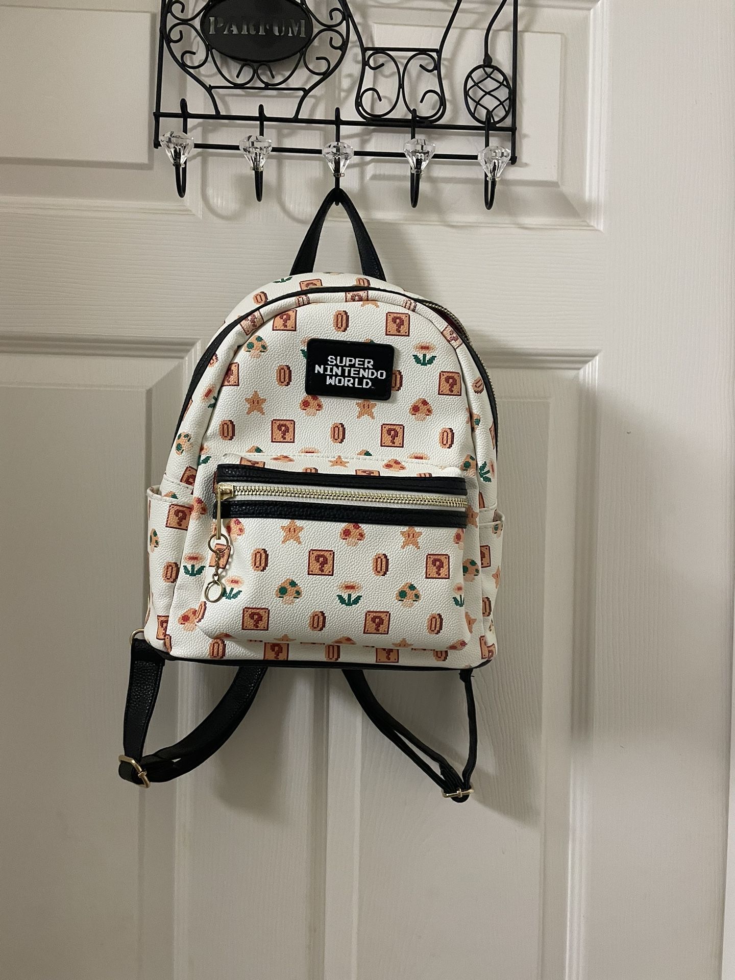 Super Nintendo World White Pixel Print Mini Backpack Amazon.com: Bioworld Super Nintendo Mario Kart 8-Bit  main image 2