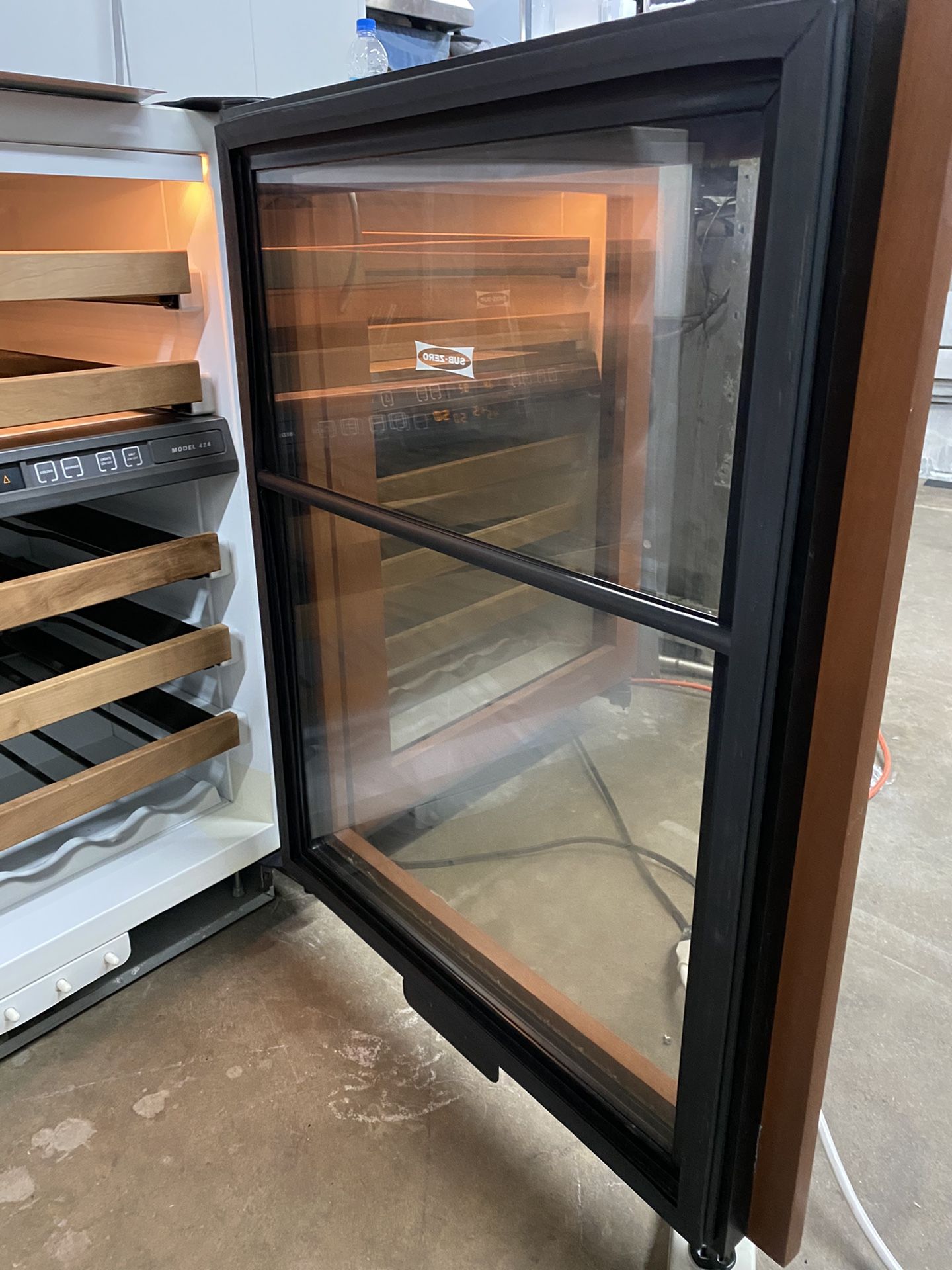 Sub zero 424 wood paneled wine fridge 80 bottle each 2 available. dual