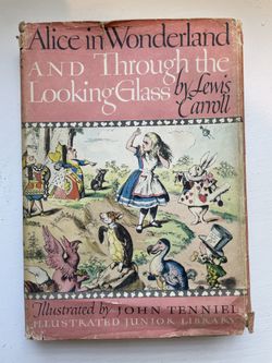 Alice in Wonderland and Through the Looking Glass by Lewis Carroll 1946 HC. Condition is pre owned and shows signs of wear as most all of these rare c