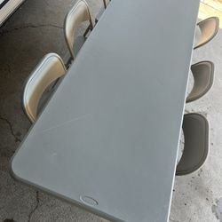 1 Large Table And 6 Metal Chairs