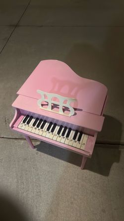 Pink kid piano for sale