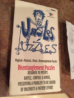 Uncles puzzles - Disentanglement puzzle